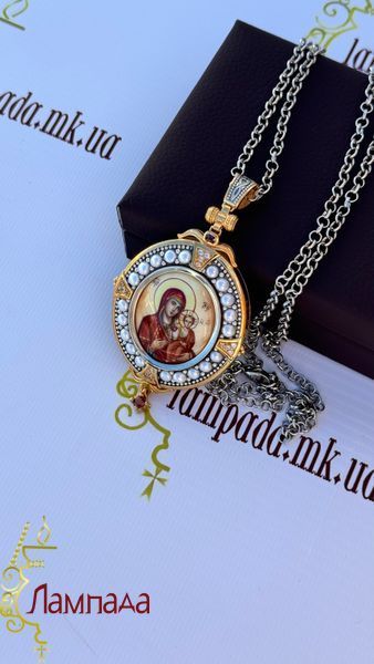 Панагия изготовлена ​​из серебра 925 пробы, в позолоте украшена жемчугом. STK-121A фото